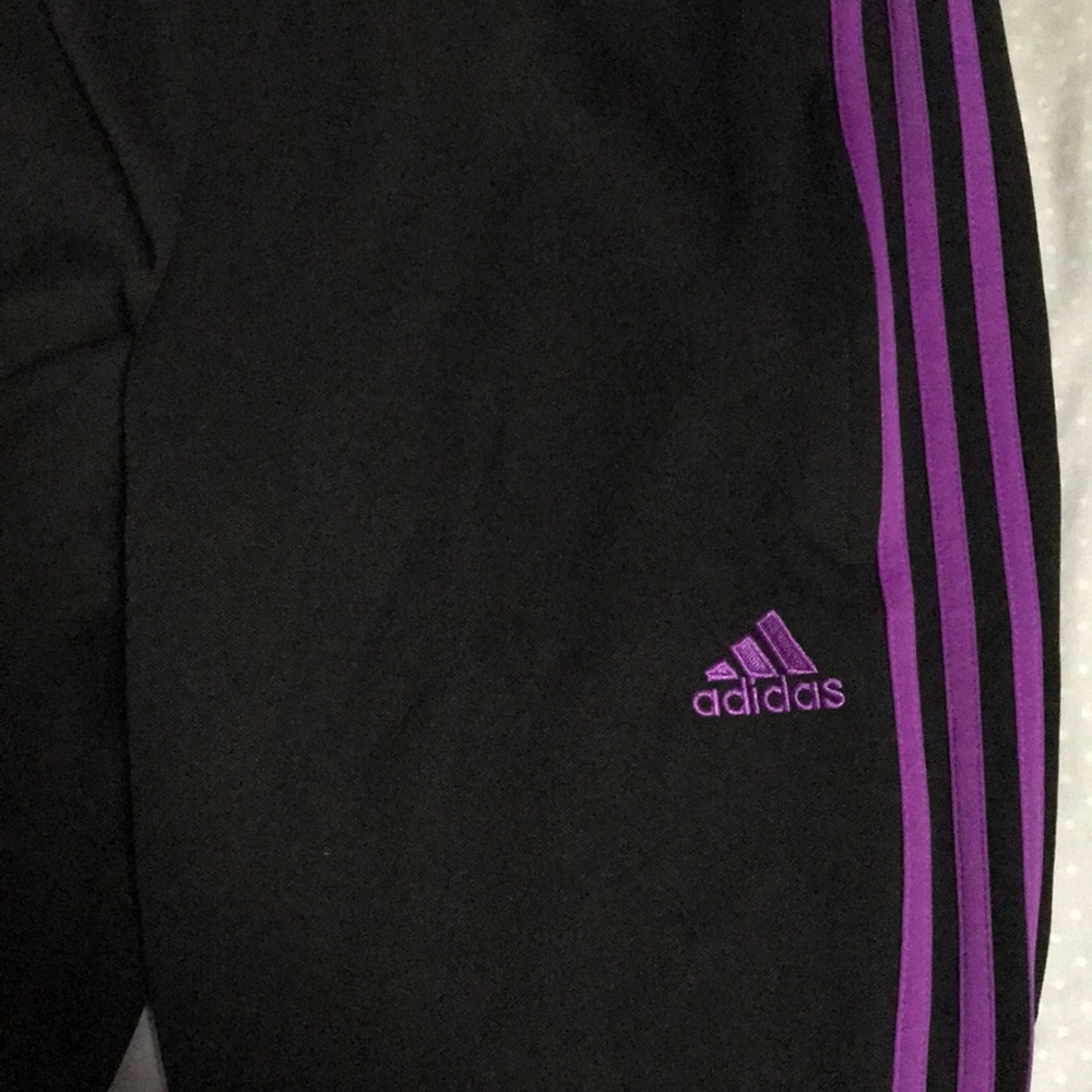 purple Adidas sweatpants
